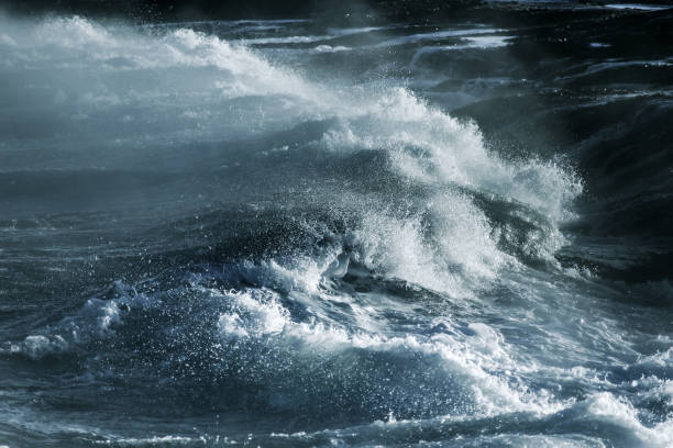 istock Big stormy ocean wave. Blue water background 673237466