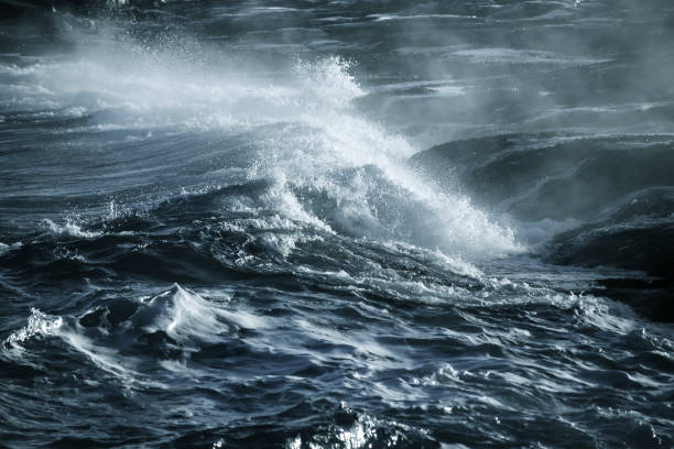 istock Big stormy ocean wave. Blue water background 673237700