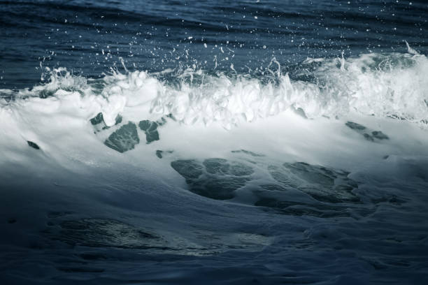 istock Big stormy ocean wave. Blue water background 673238468