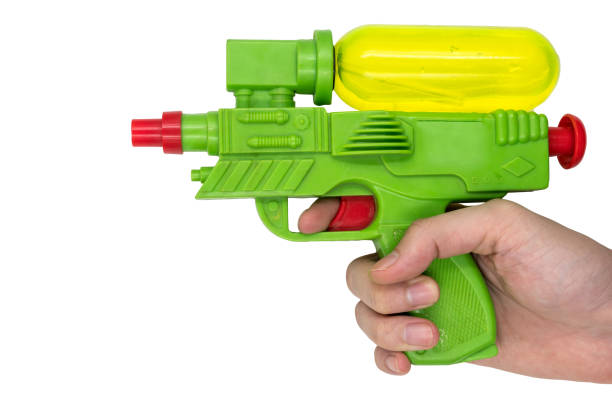 istock Hand holding Gun water toy on white background. 673263090