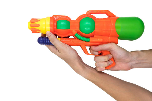 istock Hands holding Gun water toy on white background. 673263102