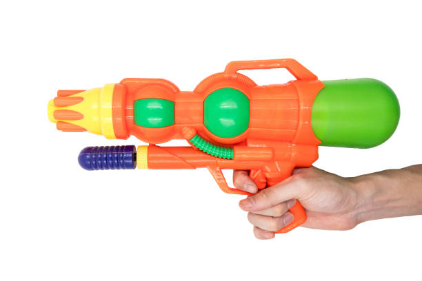 istock Hands holding gun water toy on white background. 673263146