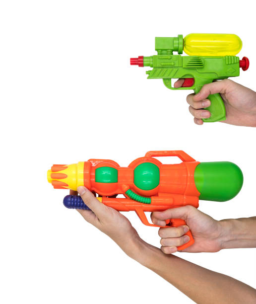 istock Hands holding Gun water toy on white background. 673263372