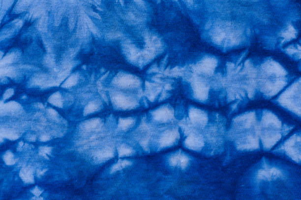 istock Dyed indigo fabric background and textured 673273094