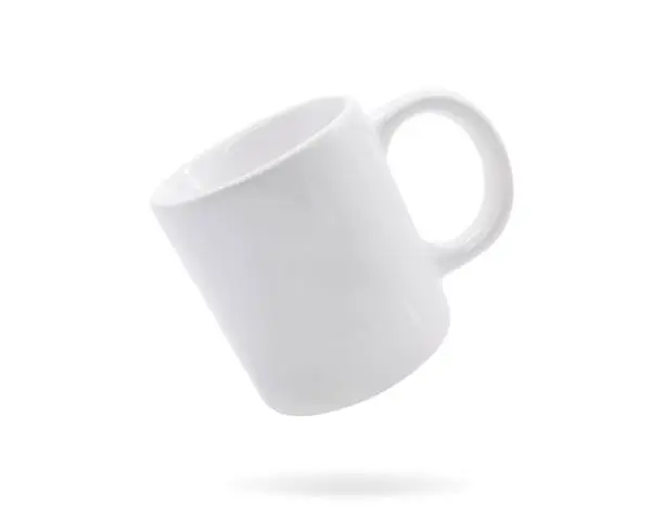White ceramic handle mug on isolated background with clipping path.