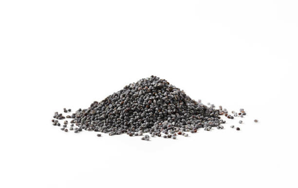 Whole black poppy seeds Heap of whole poppy seeds on white background poppy seed stock pictures, royalty-free photos & images