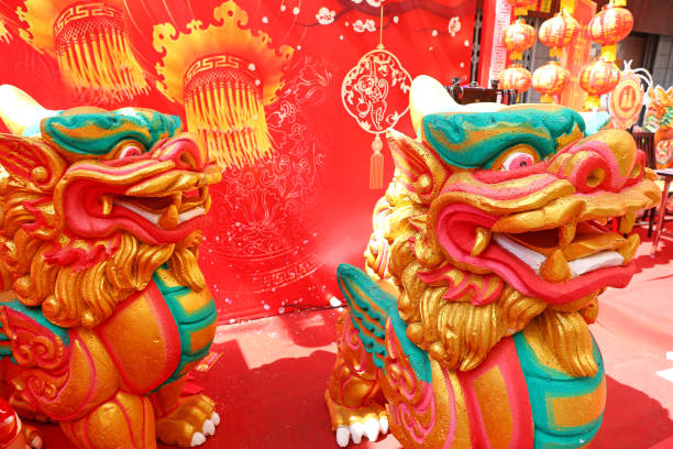 istock Close-up Detail face Chinese lion statue. 673299836
