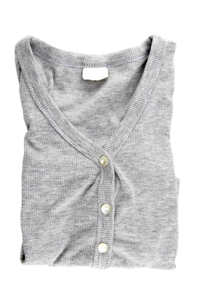 istock folded gray sweater isolated on white background. Top view. 673304486