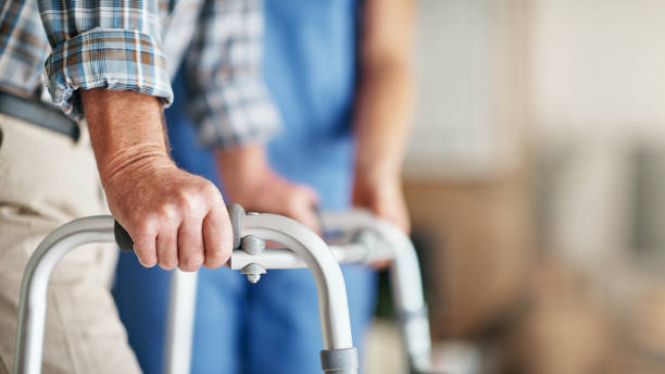 The right support will do you good Shot of a woman assisting her elderly patient who's using a walker for support medical equipment stock pictures, royalty-free photos & images