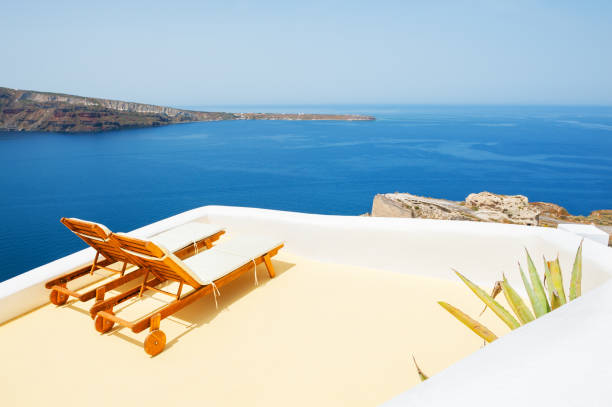istock Chaise lounge on the terrace with sea view. 673307194