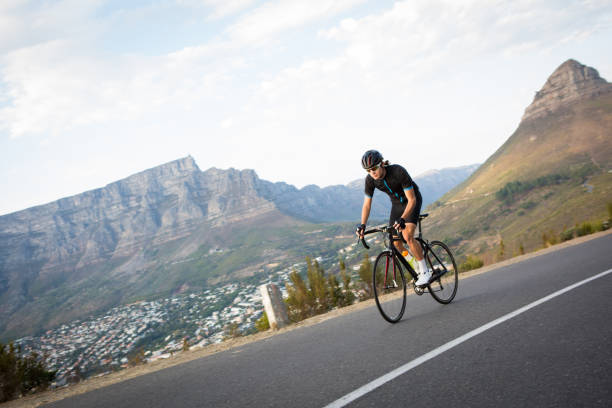 istock Determined male cyclist out on a morning training ride 673308864