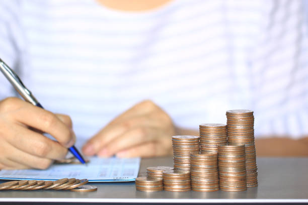 istock Saving money concept with stack money coin for growing 673314510