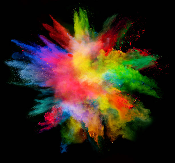 istock Explosion of colored powder on black background 673314764