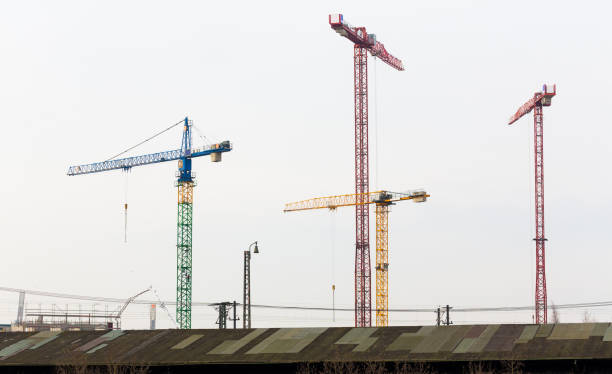 istock Four cranes on building site in Hamburg. 673317848