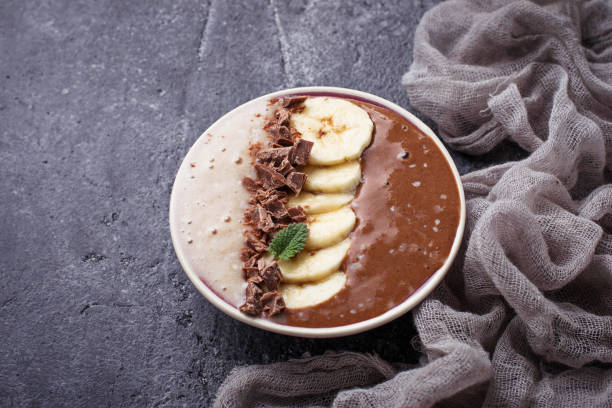 istock Banana and chocolate smoothie bowl 673322306