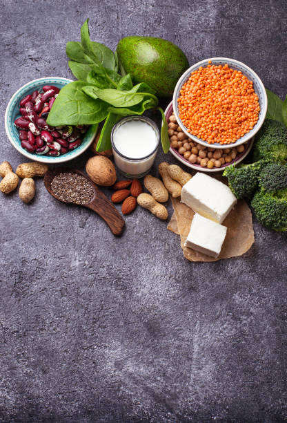 istock Lentils, chickpea, nuts, beans, spinach, tofu, broccoli and  chia seeds. 673322626