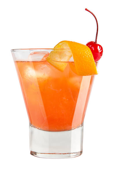 istock Refreshing cocktail with orange peel and maraschino cherry decoration 673323574