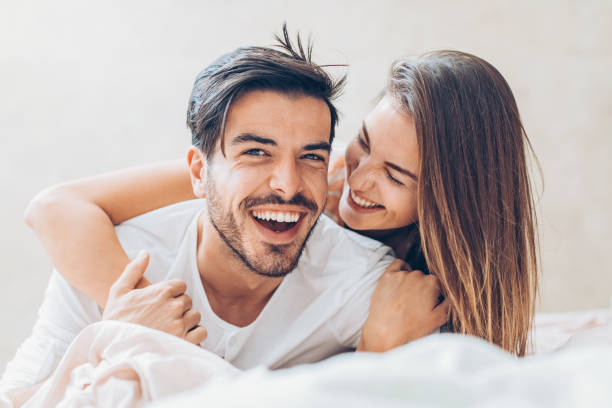 istock Couple in love in bed 673323640