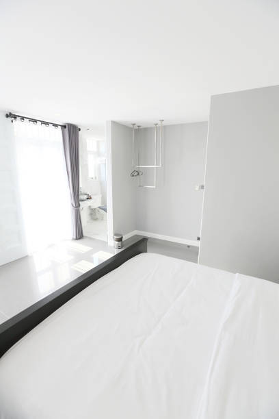 istock Interior of a luxury double bed hotel bedroom 673326246