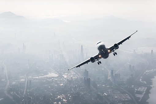 airplane and cityscape