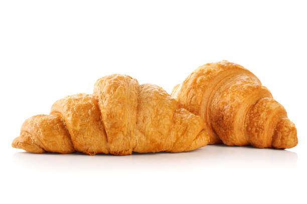 istock Croissant isolated on white background 673331160