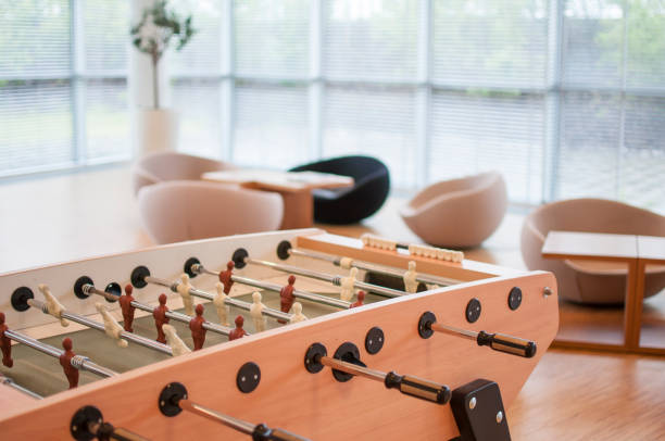 Table soccer in a large office room