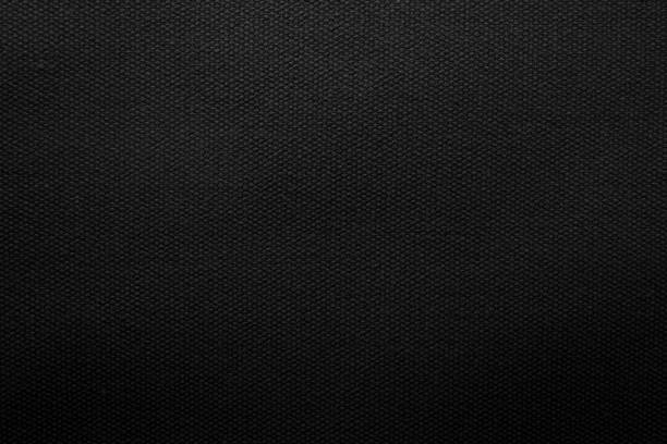 istock Black fabric texture background. Detail of canvas textile material. 673337646