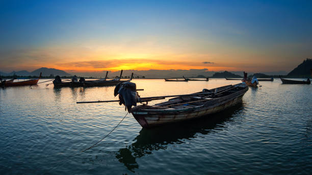 istock Long tail Boat at Ranong estuary, Thailand 673343748