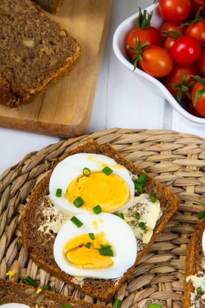istock Healthy whole wheat sandwiches with eggs and chives 673353998
