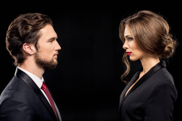 istock Serious couple in formal wear 673354402