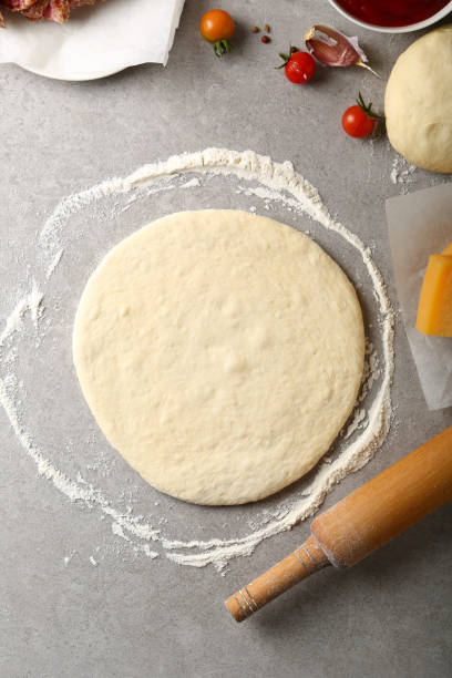 istock Cooking pizza ingredients, food top view 673357832