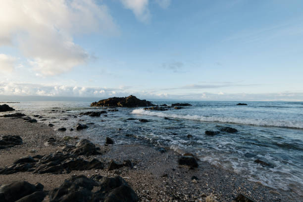 istock Rocky Beach at the Tropics at sunset. 673358040