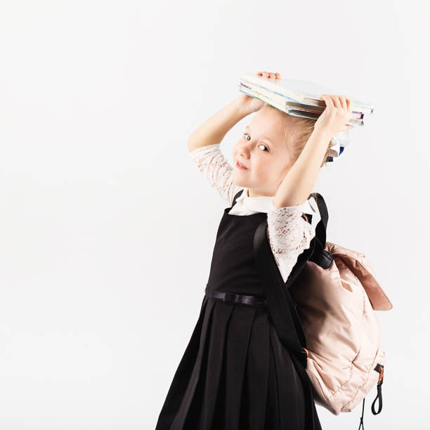 istock Book, school, kid. little student holding books. 673367826