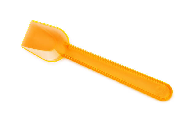 Ice cream spoon Small plastic ice cream spoon isolated on white ice cream on spoon stock pictures, royalty-free photos & images