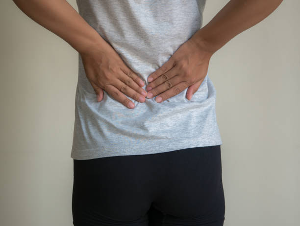 istock woman back and Spine Pain . 673375534