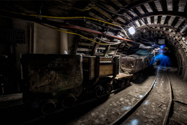 istock Ghosts of miners in the coal mine 673375740