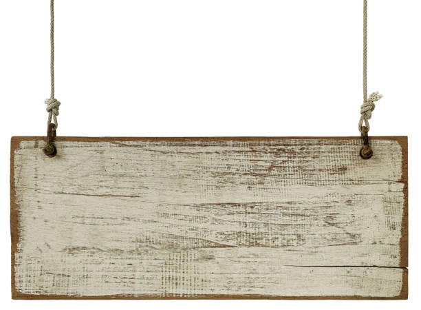 istock Old weathered worn white wooden sign panel, hanging by old rope, isolated on white, clipping path included. 673375966