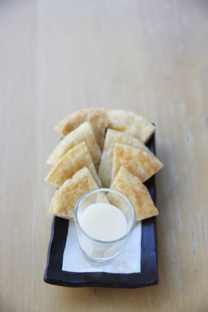 istock roti with milk on wood background 673393480