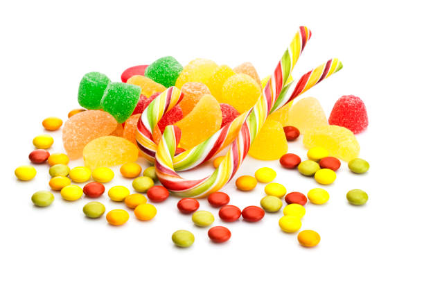 istock Candybar and fruit candies on white background 673393730