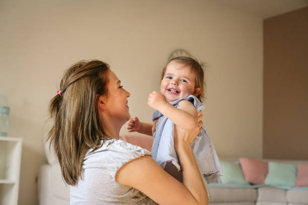 istock Mother with her  daughter at home. 673400330