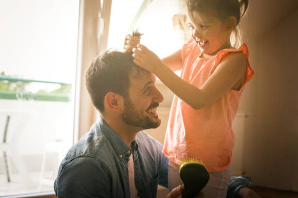 istock Father and daughter spending funny time at home. 673401190