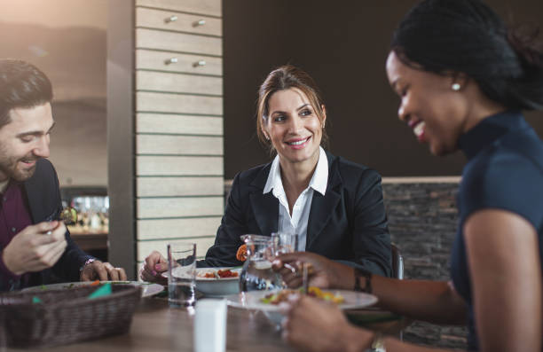 istock Business people in a cafe restaurant on a lunch break 673417914