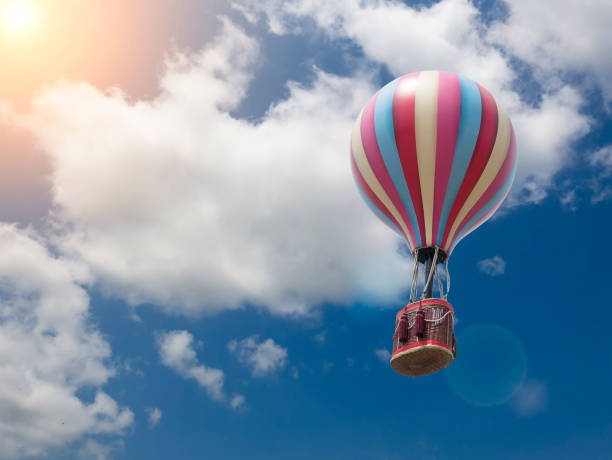 istock hot air balloon is flying at sunrise 673422760