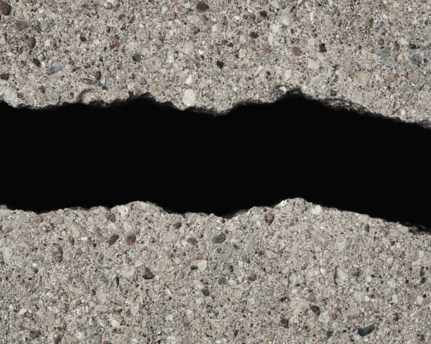 Cracked road isolated on black