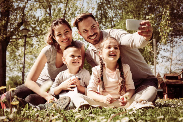 istock Happy family in the park. 673436210