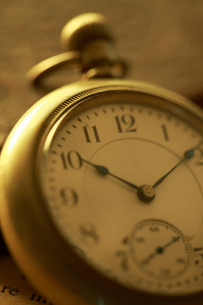 istock Pocket watches and books 673459330
