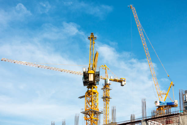istock Construction site and operation of tower cranes. 673468618