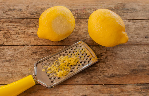 istock Lemon on old wooden background. 673474880