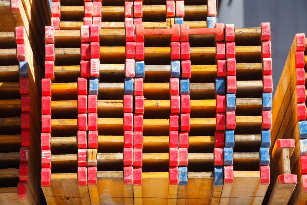 Stacked wooden boards on a construction site