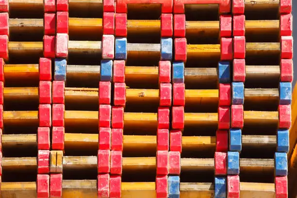 Stacked wooden boards on a construction site